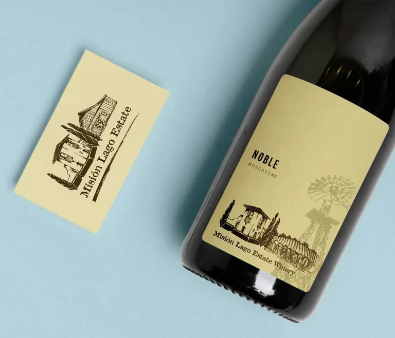 A Bottle of wine and business card showing Mision lago Estate Wine Label & Logo